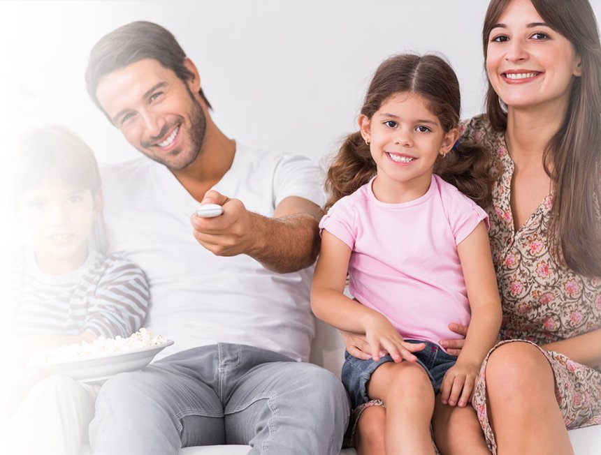 A smiling family with two children.